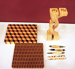 3D Cutting Boards, Twisted Candle Sticks, and Turned Pens by Karen Sheldon - Walnut, Cherry and Maple 3D Cutting Boards, Twisted Candle Sticks, and Turned Pens by Karen Sheldon